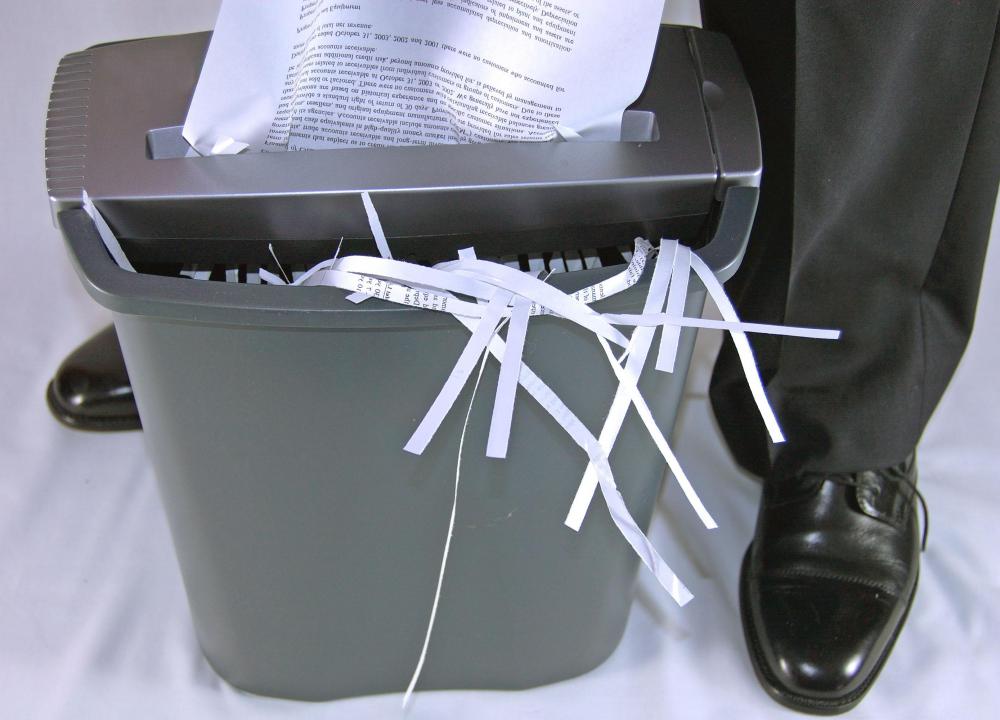 Shredding documents that contain sensitive information can help corporations maintain physical information security.