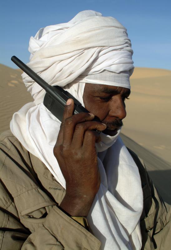 A satellite phone can be used anywhere, even in the middle of the desert.