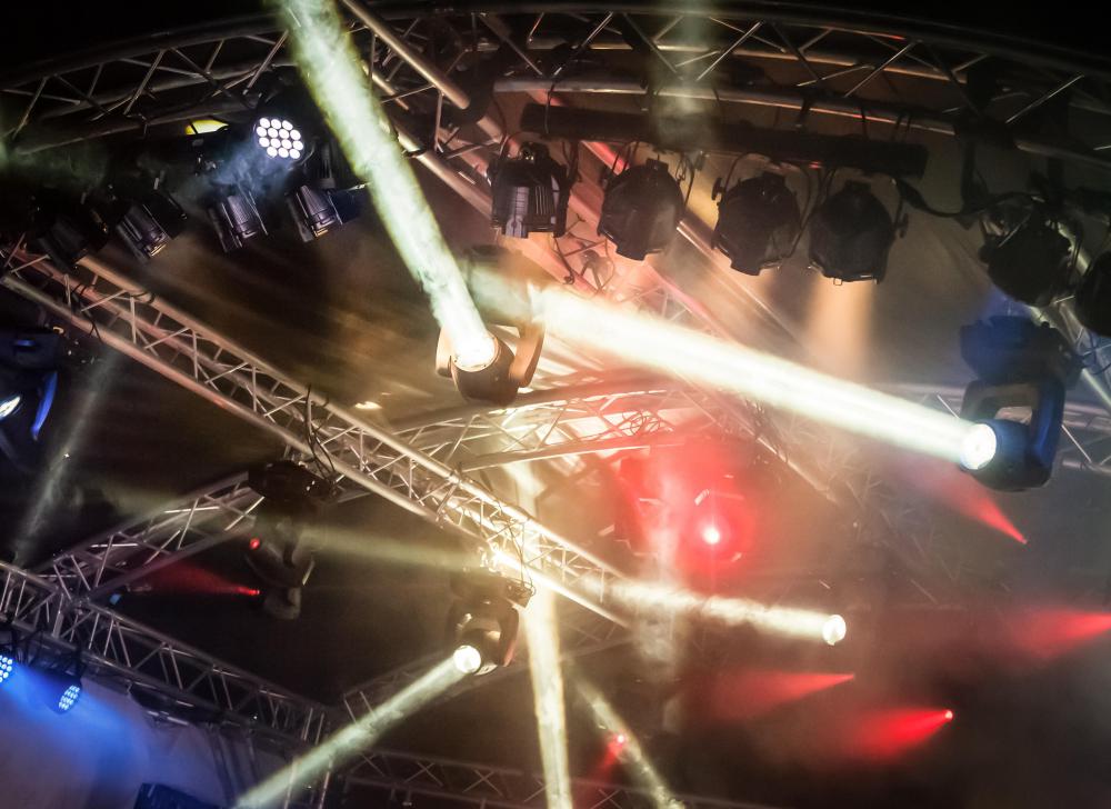 A fog machine may be used in a nightclub to enhance lighting around the dancers.