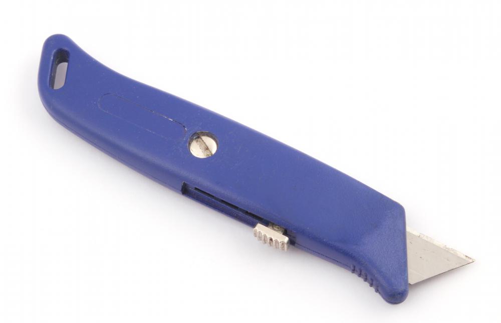 Using a box cutter is a risky but feasible way to open an iTouch.