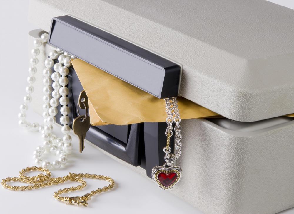 Storing important documents in a safety deposit box may help against identity theft.