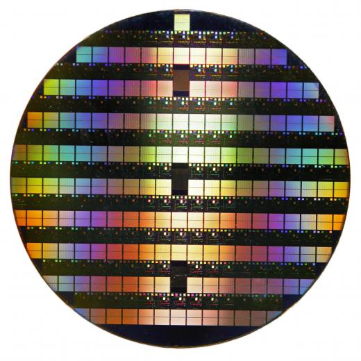 A silicon wafer is produced after a lengthy series of manufacturing steps.