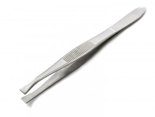 Tweezers may be used to move a small BIOS jumper.