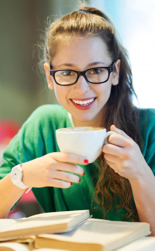 College students may go to a coffee shop to use wifi, study, and drink coffee.