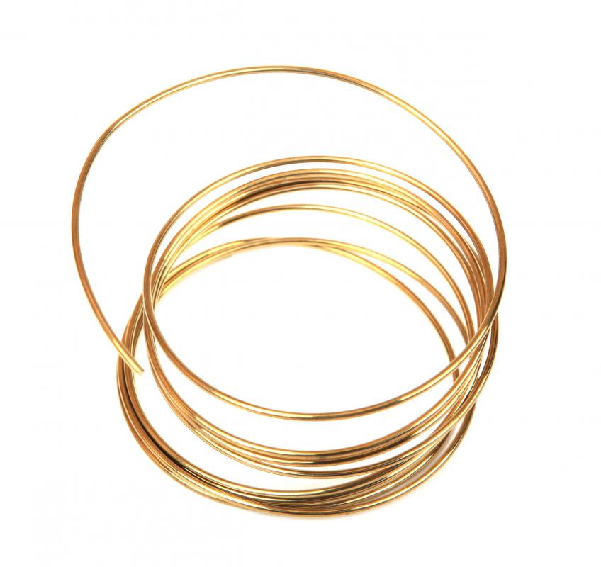 Cat-5 cable wiring often features gold plated wires, because of gold's strength as an electrical conductor.
