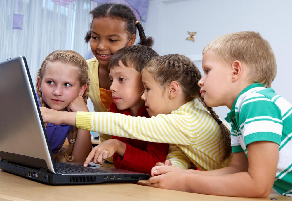 Kids Around A Computer 