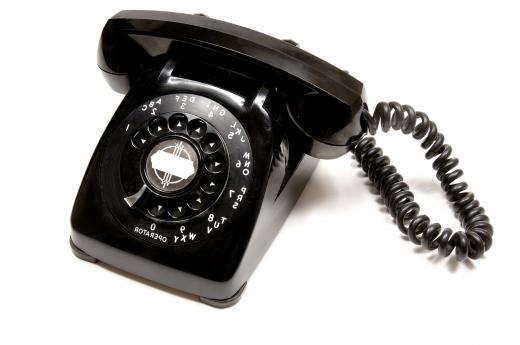 A black rotary phone.