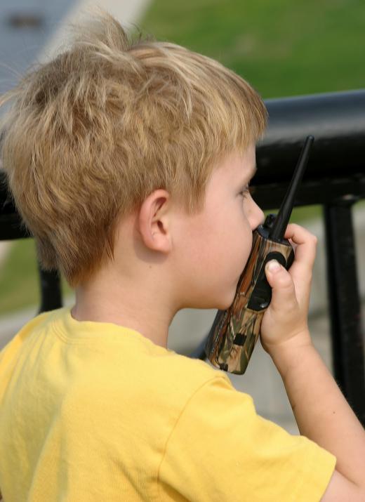 The maximum range capability of walkie talkies is determined under perfect conditions.