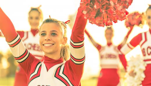 College cheerleaders often use megaphones to amplify their cheers.