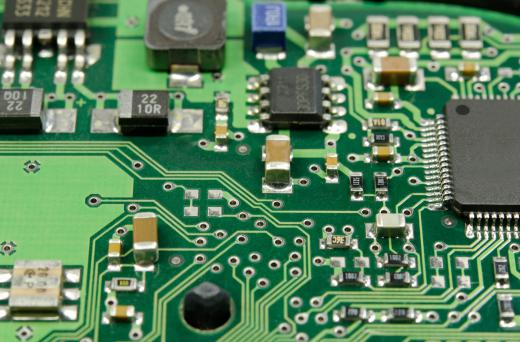 Circuit boards hold insulators and other tiny electronic components.