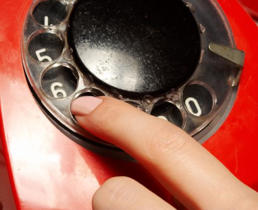 Dialing a rotary phone used a number of clicks, or pulses, to dial.