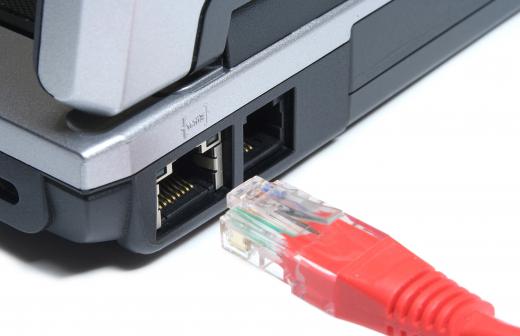 An Ethernet cable connecting to a laptop.