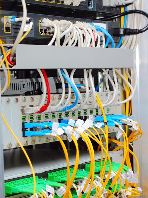 A fiber-optic patch panel allows cross connections.