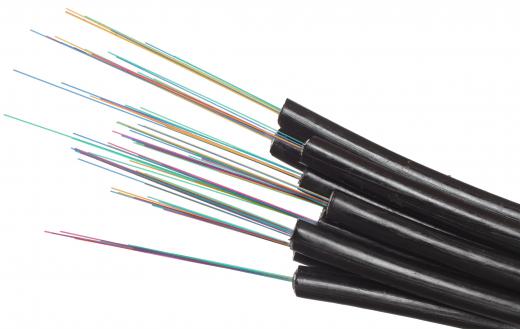 Fiber optic technology involves using optical fibers that have been bundled together and encased in a cable to transmit data through pulses of light.