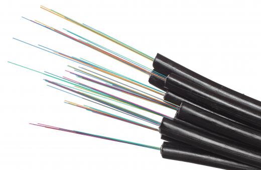 Fiber-optic cables carry coded information through flexible tubing.