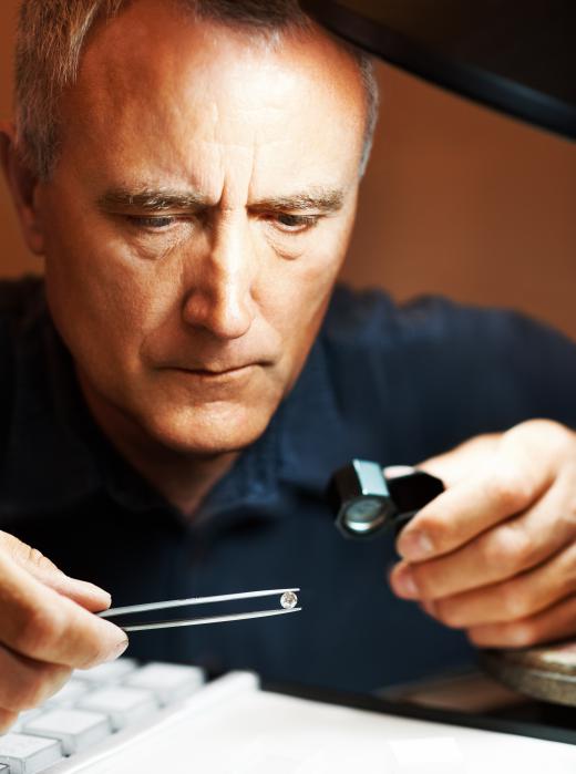 Jewelers use loupes to look for flaws in gems.