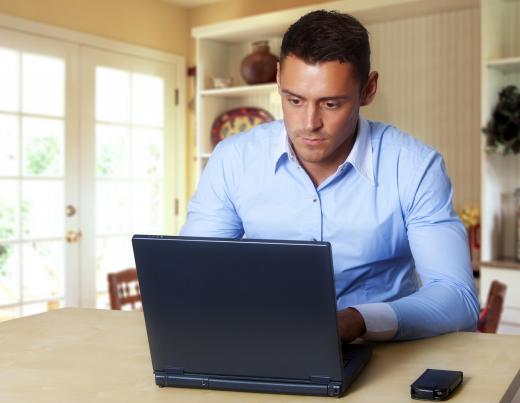 A telecommuter works out of his home.