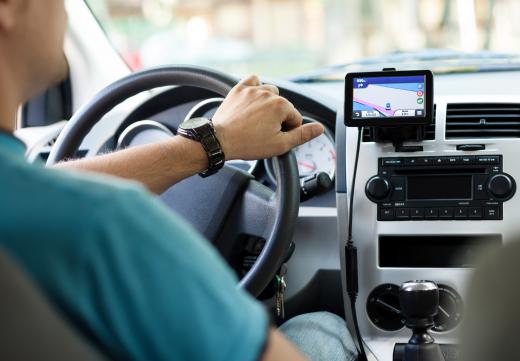 A GPS mount is intended for use in a car with a GPS device.