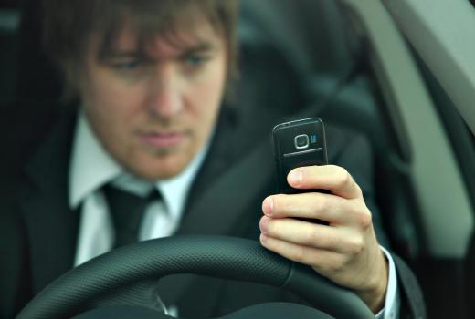 The popularity of SMS has led some states to make texting while driving illegal.