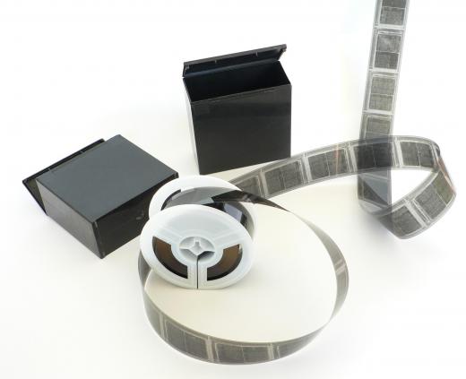 Microfilm reel and microfilm storage box.