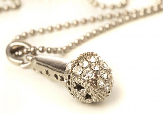 A hidden microphone may be concealed within jewelry or other ordinary items.