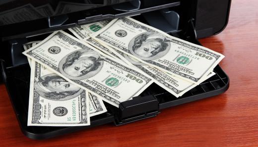 Using a design program to make counterfeit money is a computer crime.