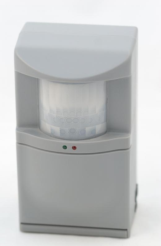 A passive infrared motion detector is a device that detects moving objects by detecting the infrared light they emit.