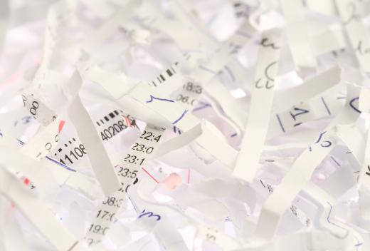 Paper is generally shredded into small strips or confetti like pieces.