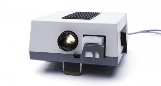 A slide projector lamp has an allocated slot for 35 millimeter slides.