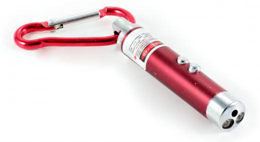 A small laser pointer on a carabiner.