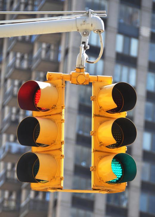 Some traffic lights have camera robots to take photos of vehicles running a red light.